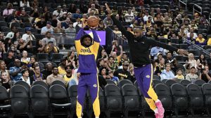 Photo of LeBron Pestering Bronny James During Lakers Pregame Warmups Is a Classic