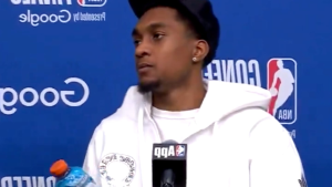 Jaden McDaniels Receives Sad Answer to Request to Take Drink from Postgame Podium