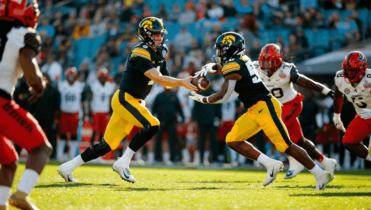 NCAA football sees Iowa dominate Vanderbilt 40-16 in ReliaQuest Bowl, playoff quarterfinals continue tonight