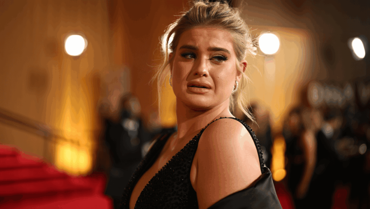 Kelly Osbourne admits she's 'not doing great' at Grammys honoring late dad Ozzy